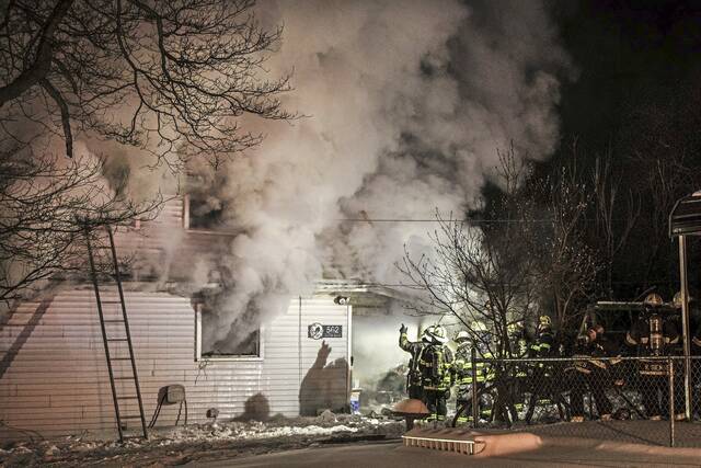 2 hospitalized in New Kensington fire; crews fight flames in below-zero temps