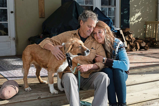 
			
				                                Marc Fogel in December with wife, Jane, and their dog, Poppy, at their Slippery Rock cottage. (Kristina Serafini | TribLive)

			
		