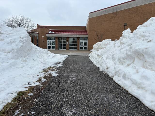 Tireless team effort: Crews from multiple North Allegheny departments work well in the snow