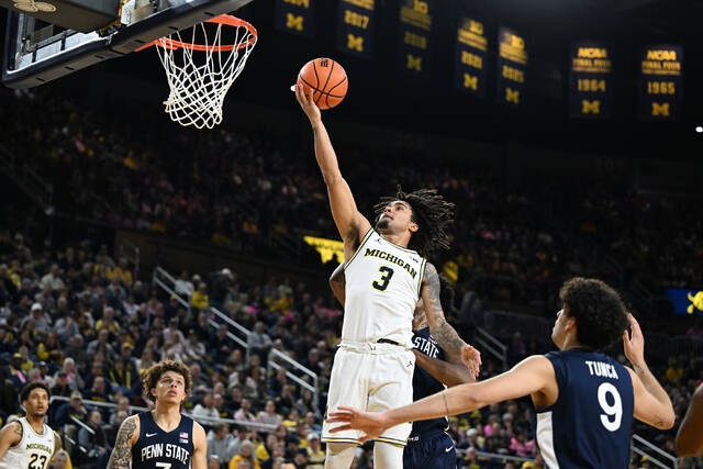Burnett scores career-high 31, No. 2 Michigan routs Penn St 110-69 to reach school-record 21-1 mark