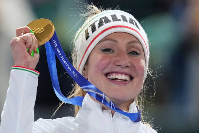 Olympics roundup: Italians collect medals on feel-good 1st day for hosts