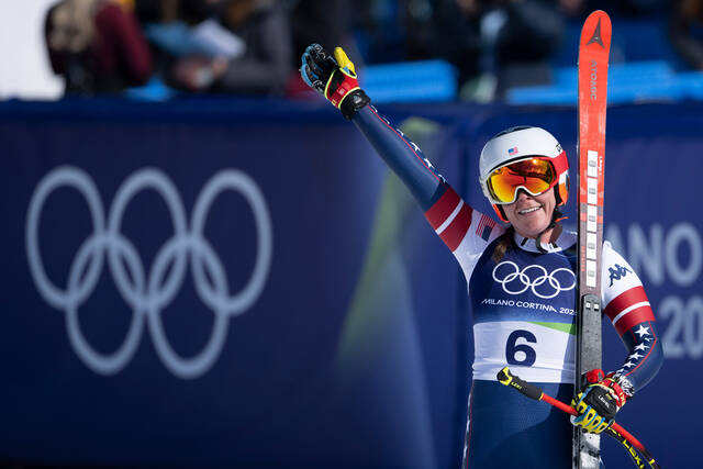 Breezy Johnson wins Olympic downhill on day marred by American teammate Lindsey Vonn’s crash