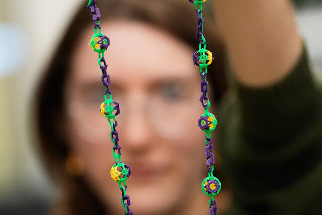 Biodegradable Mardi Gras beads help make Carnival season more sustainable