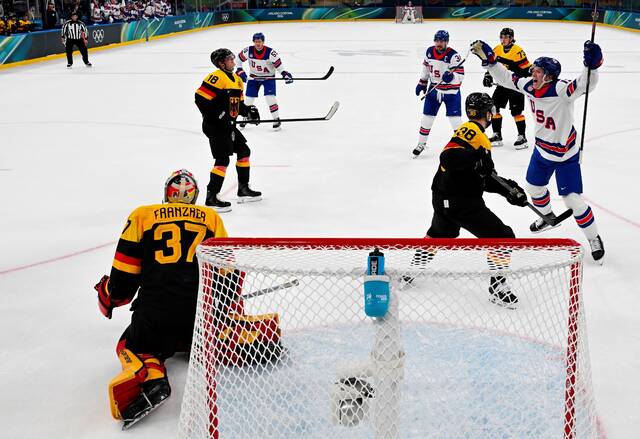 U.S. beats Germany to stay unbeaten at the Olympics, but Canada is the top seed