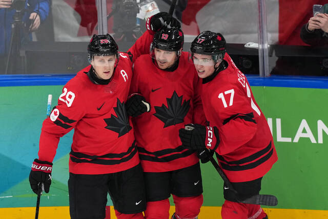 Nathan MacKinnon scores late as Canada beats Finland to reach the Olympic gold-medal game