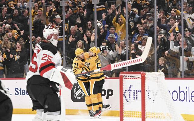 Penguins beat Devils in 1st game after Olympic break without Sidney Crosby