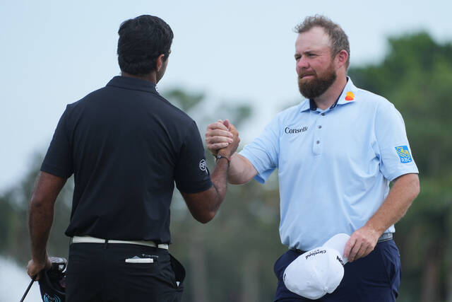Shane Lowry and Austin Smotherman tied for the Cognizant Classic lead at 13 under