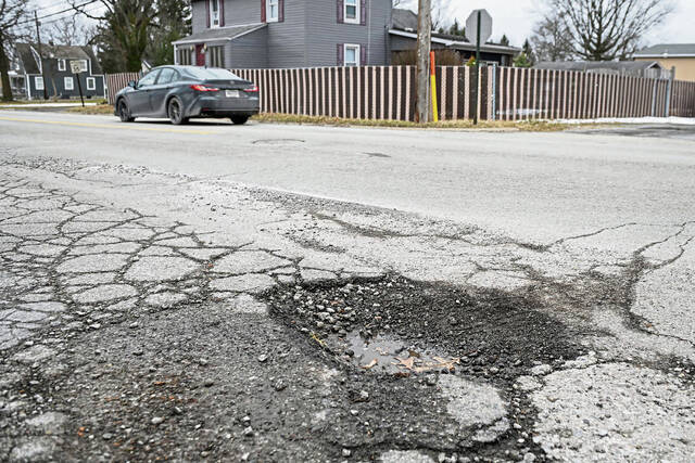 Freeze-thaw cycle leaves region scrambling to fill potholes