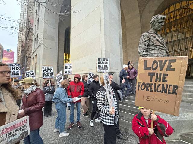 Dozens gather at the City-County Building in Downtown Pittsburgh to protest military action in Iran