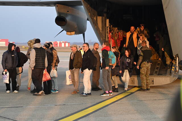 Governments scramble to bring citizens home during travel chaos caused by war in Middle East