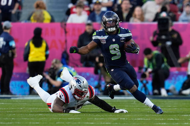 Kenneth Walker headed to Kansas City, Malik Willis starts QB reset in Miami, AP sources say