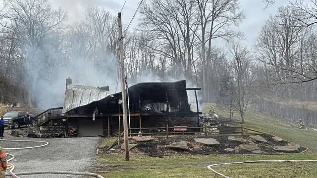 Crews battle house fire in Plum