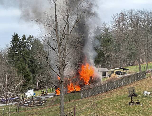 Fire destroys Plum home