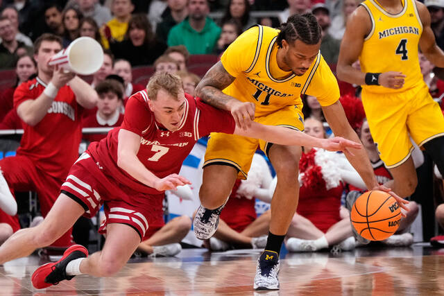 Michigan hits 3-pointer with 0.4 seconds left to sink Wisconsin in Big Ten semifinals