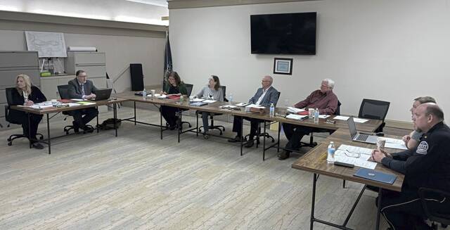 Leet officials considering a proposed resolution limiting interactions with ICE