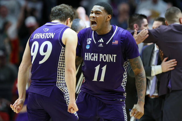 NCAA roundup: High Point stuns Wisconsin on Chase Johnston’s first 2-point basket of season