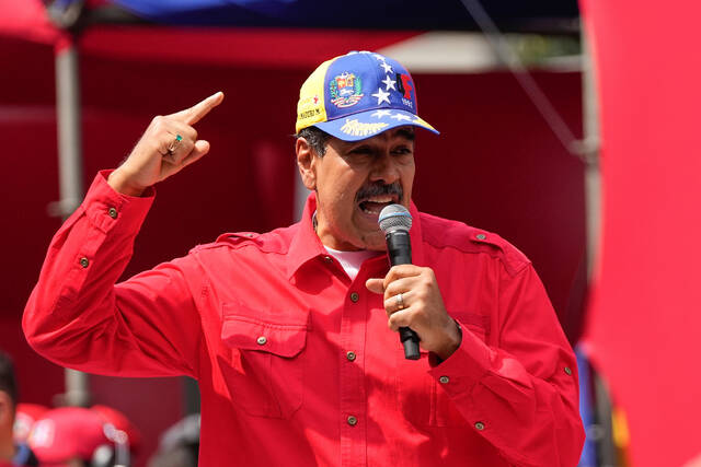 Nicolás Maduro arrives in court in New York, fighting charges as Venezuela moves on without him