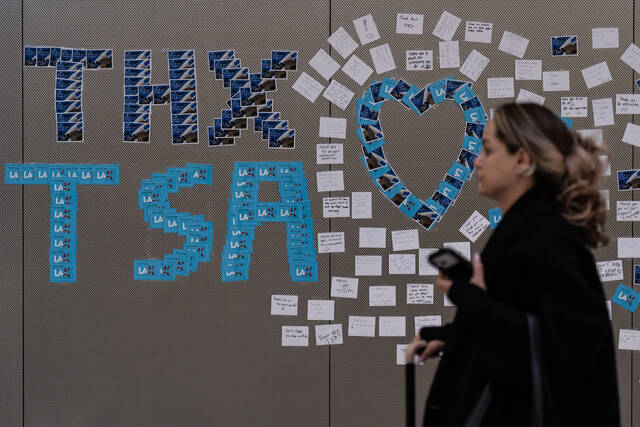TSA workers might get paid Monday, but their worries and airport woes could linger for longer