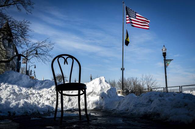 
			
				                                A parking chair reserves a space along Shiloh Street on Mount Washington this past winter. (Massoud Hossaini | TribLive)

			
		