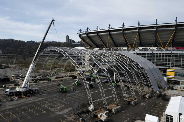 
			
				                                Work continues on the NFL Draft stage outside of Acrisure Stadium on the North Shore on Saturday, April 4, 2026. (Kristina Serafini | TribLive)

			
		