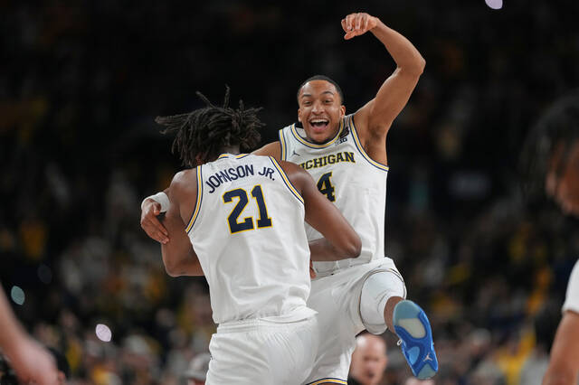 Michigan powers to 2nd national title and first since 1989