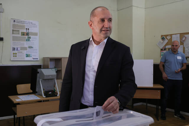 Tired of political turmoil, Bulgarians give ex-president a convincing mandate for change