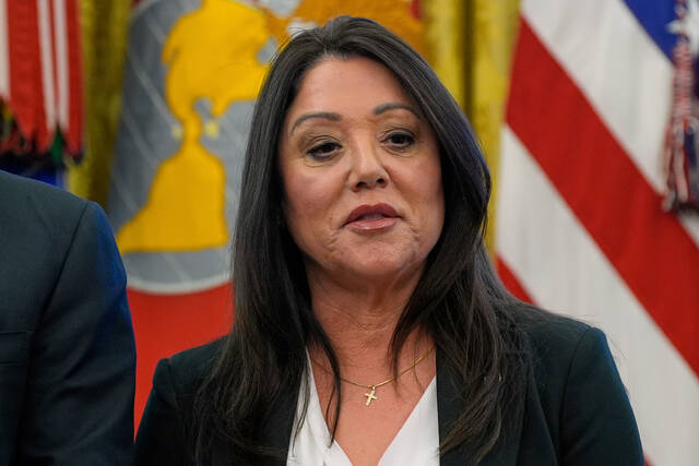 
			
				                                Labor Secretary Lori Chavez-DeRemer listens as President Donald Trump speaks with reporters while signing executive orders in the Oval Office of the White House in Washington. (AP)

			
		