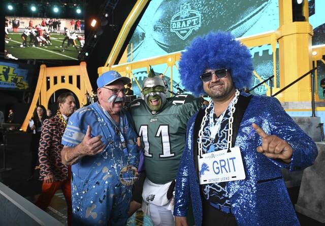 Photos: Fans show their team colors at the NFL Draft