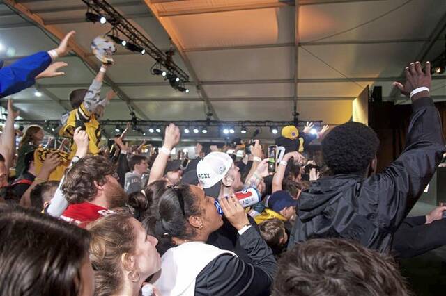 Football enthusiasts gather for Topps card event at NFL Draft