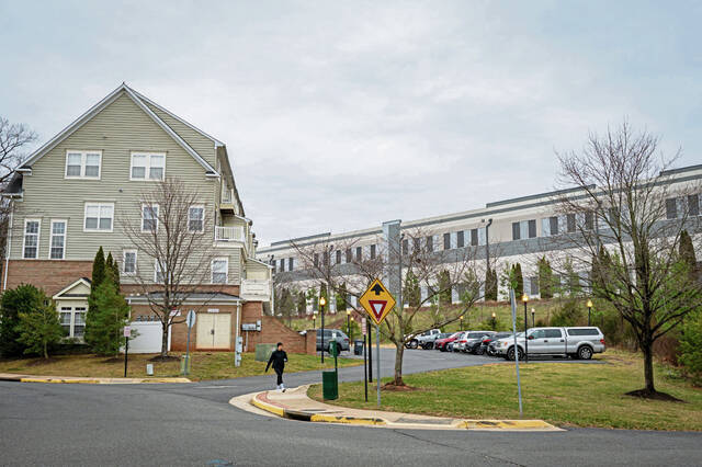 
			
				                                A data center looms over a residential neighborhood in Gainesville, Va. in Prince William County. Opinions of the center were largely negative among nearby neighbors. (Massoud Hossaini | TribLive)

			
		
