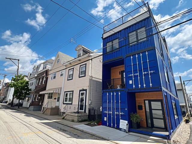 Bloomfield shipping container home offers cool digs, rooftop living