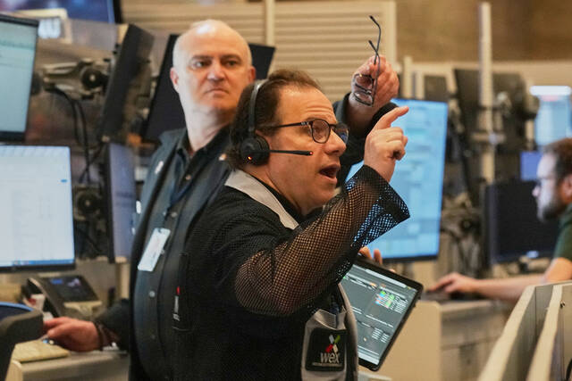 Wall Street falls from its records as oil prices jump after fighting flares in the Middle East