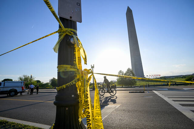 Secret Service says suspect opened fire on them and was shot in exchange near Washington Monument
