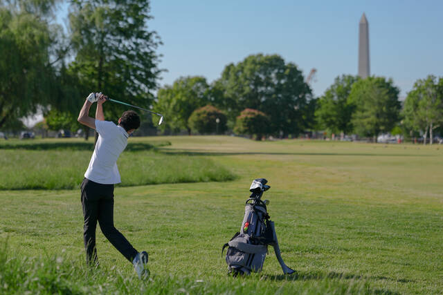 Judge in dispute over Washington golf course tells Trump officials not to cut trees without notice