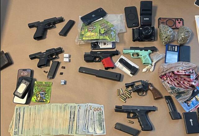 A pair of Pittsburgh residents charged with drugs, firearms violations following Carrick investigation