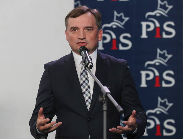 Former Polish justice minister who faces prosecution at home says he’s traveled from Hungary to U.S.