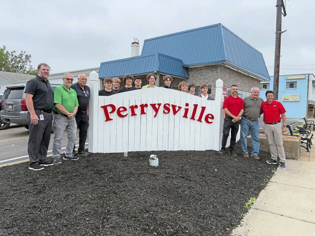 North Hills students rebuild sign welcoming visitors to Perrysville in Ross