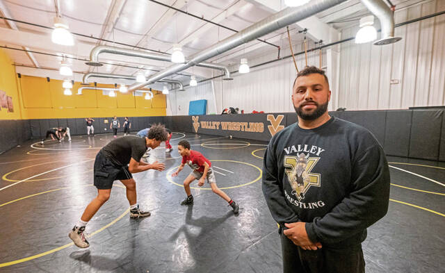 Faces of the Valley: Head wrestling coach at New Ken-Arnold starts wrestling club