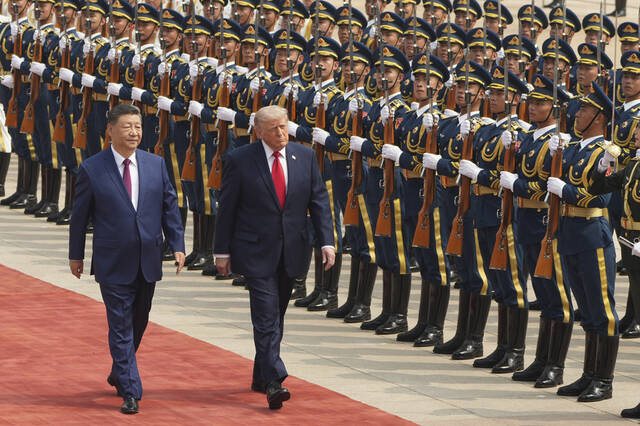 Trump has fanfare-filled meeting with Xi in China, but major breakthroughs may be elusive
