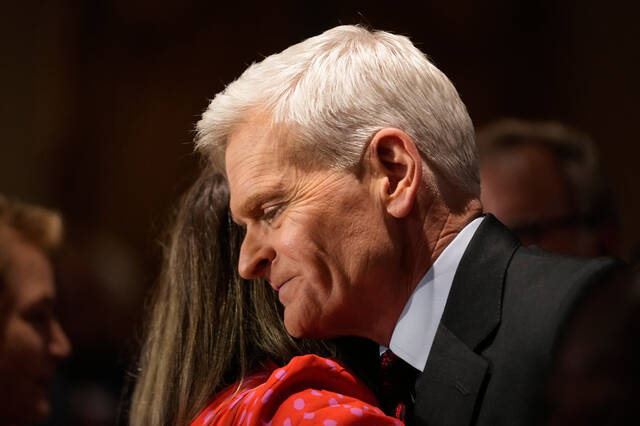
			
				                                Sen. Bill Cassidy, R-La., right, hugs a supporter during an election night watch party in Baton Rouge. (AP)

			
		