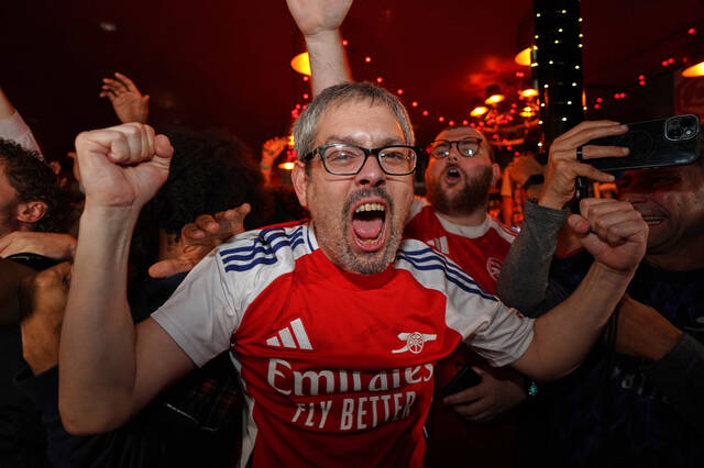 Arsenal wins its 1st Premier League title in 22 years after Man City draws with Bournemouth