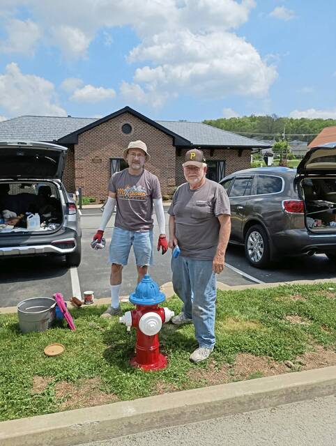 Former Export workers give hydrants a fresh patriotic makeover