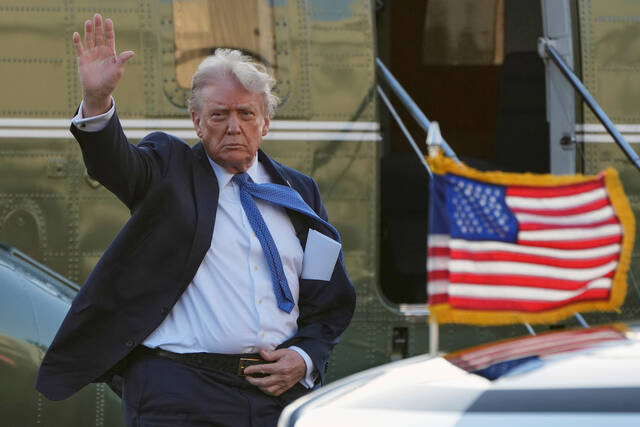 President Donald Trump arrives April 24 at Leesburg Executive Airport on Marine One in Leesburg, Va., en route to Trump National Golf Club Washington DC in Sterling, Va. (AP)