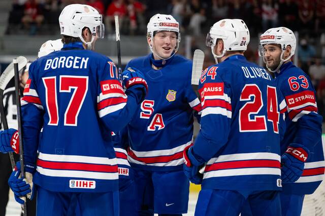 US beats Austria to set up a quarterfinal against unbeaten Canada at ice hockey worlds
