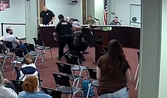 Video appears to contradict official account of arrest at Springdale Council meeting