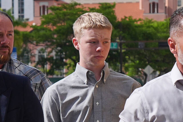 Teen charged with killing stepsister on Carnival Cruise remains free after hearing